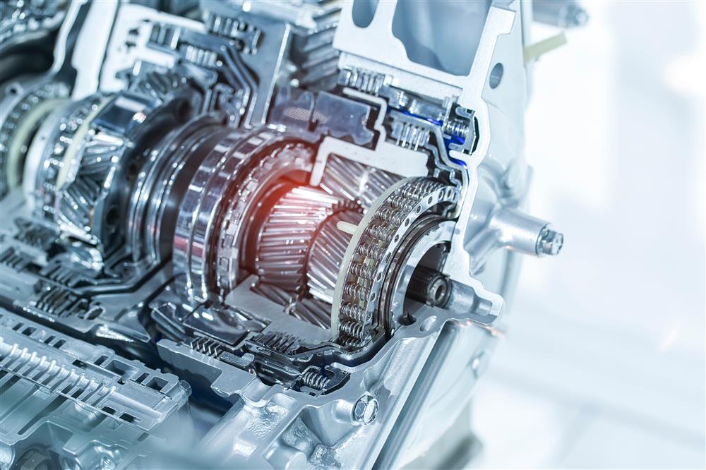 A closeup of a silver automotive transmission.